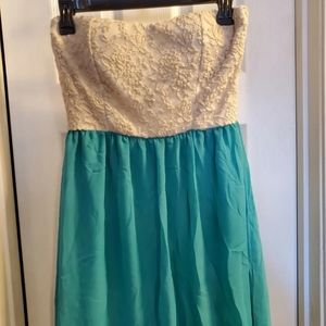 January 7 sz L, strapless dress. Cream, floral lace bodice. Padded bust.